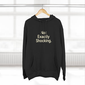 Old Man Snark black midweight fleece hoodie featuring the minimalist text Not Exactly Shocking on the chest.
