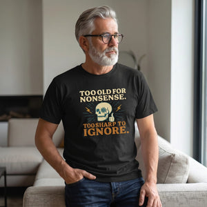Old Man Snark black t-shirt featuring a monocled skull graphic and the text Too Old For Nonsense. Too Sharp To Ignore.