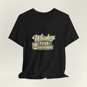 Old Man Snark black cotton t-shirt with "Whiskey Fixes Everything" graphic and whiskey glass illustration.