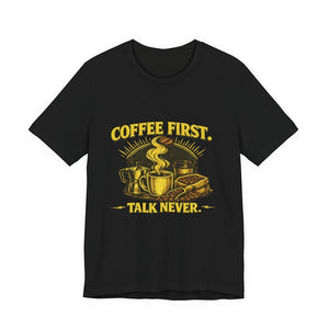 Old Man Snark black cotton t-shirt with yellow text "COFFEE FIRST. TALK NEVER." and coffee-themed graphic.