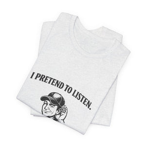 Old Man Snark off-white cotton t-shirt with black text that reads "I PRETEND TO LISTEN." above a graphic of a man cupping his ear.