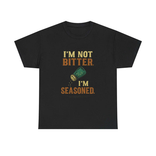 Black unisex heavy cotton tee with humorous "I'm not bitter. I'm seasoned." slogan and salt shaker graphic