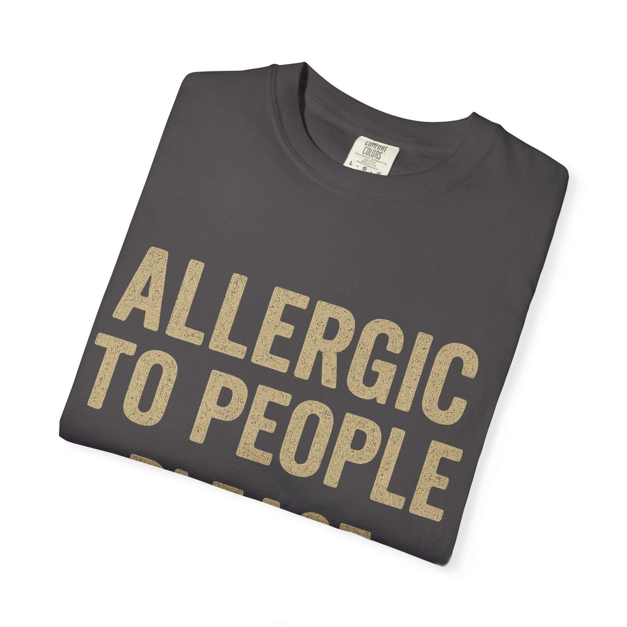 Folded dark grey T-shirt with "Allergic to People Please Maintain Distance" funny text print