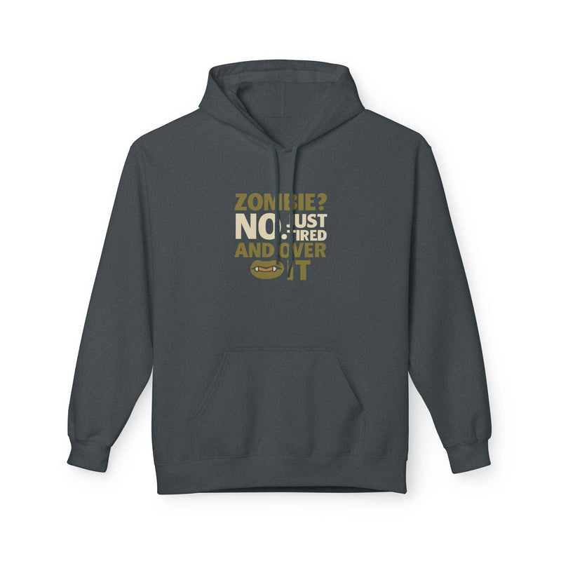 Dark gray zombie humor fleece hoodie with kangaroo pocket and funny "Zombie? No, just tired and over it" text design, unisex casual sweatshirt for cozy wear and Halloween