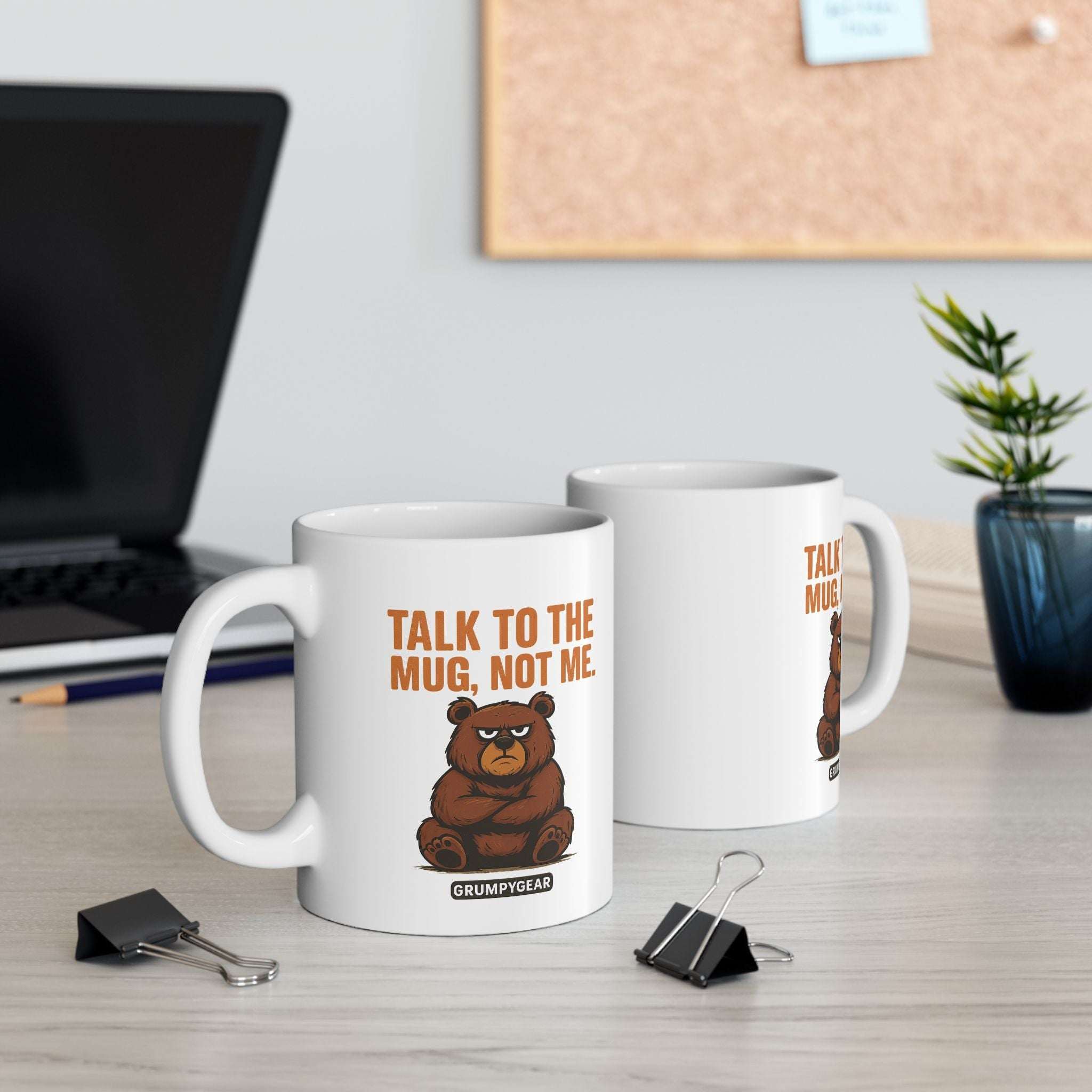 Funny ceramic mug with grumpy bear illustration and "Talk to the Mug, Not Me" text, glossy finish, microwave and dishwasher safe.