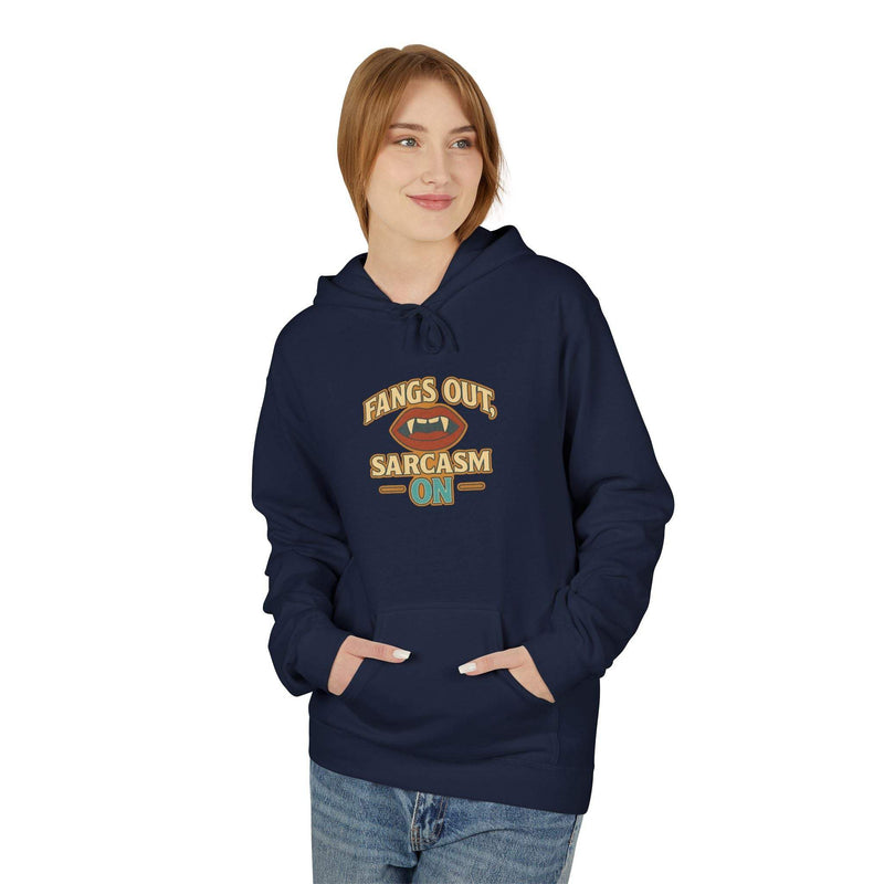 woman wearing navy Fangs Out Sarcasm Hoodie with front pouch pocket and playful sarcastic text design