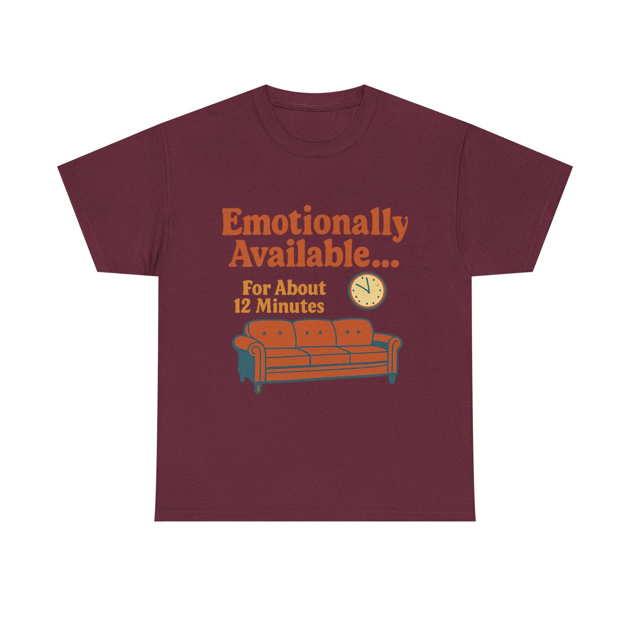 Maroon heavy cotton tee with humorous "Emotionally Available... For About 12 Minutes" text and sofa graphic, unisex casual wear.