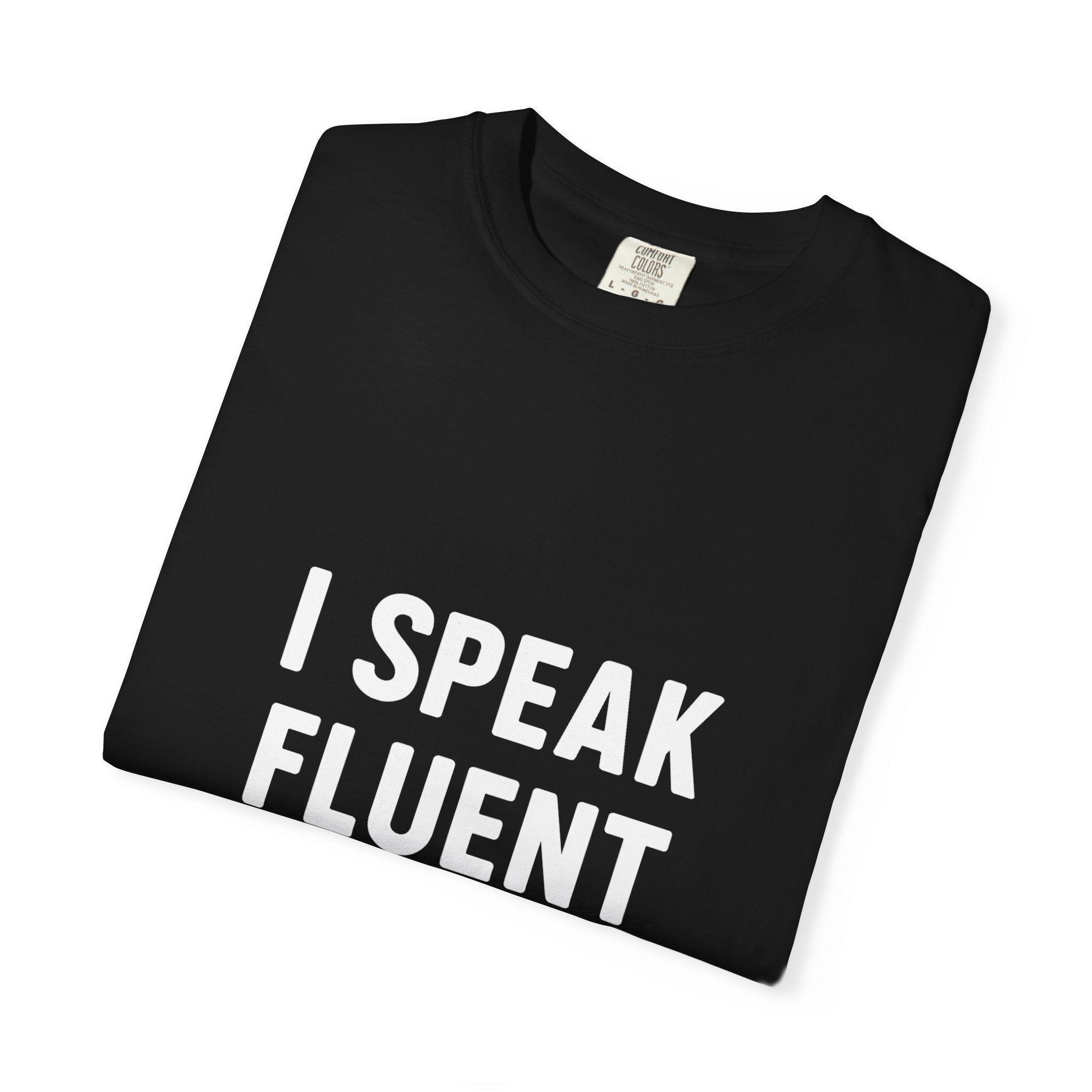 The Printify Sarcastic Eye Roll Unisex T-shirt is a folded black tee with bold white "I SPEAK FLUENT" text—ideal for anyone who loves witty, humorous quotes and a touch of sarcasm.