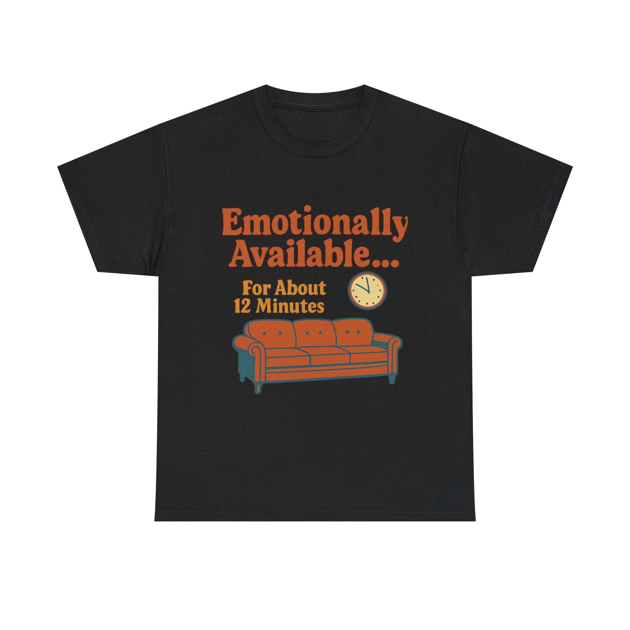 Black unisex heavy cotton tee with orange text "Emotionally Available... For About 12 Minutes" and graphic of a couch and clock.