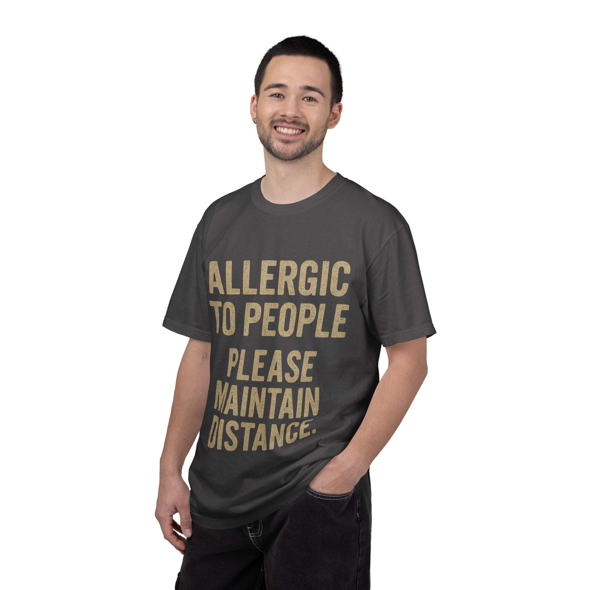 Man wearing dark gray "Allergic to People Please Maintain Distance" funny text t-shirt