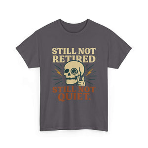 Vintage Skull Unisex Tee with retro skull and "Still Not Retired Still Not Quiet" slogan on gray background