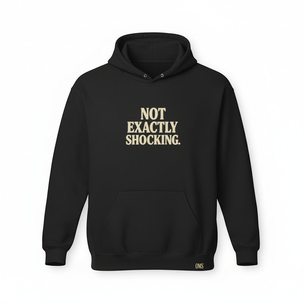 Old Man Snark black cotton-blend fleece hoodie with "NOT EXACTLY SHOCKING." graphic text on chest and OMS logo on hem.