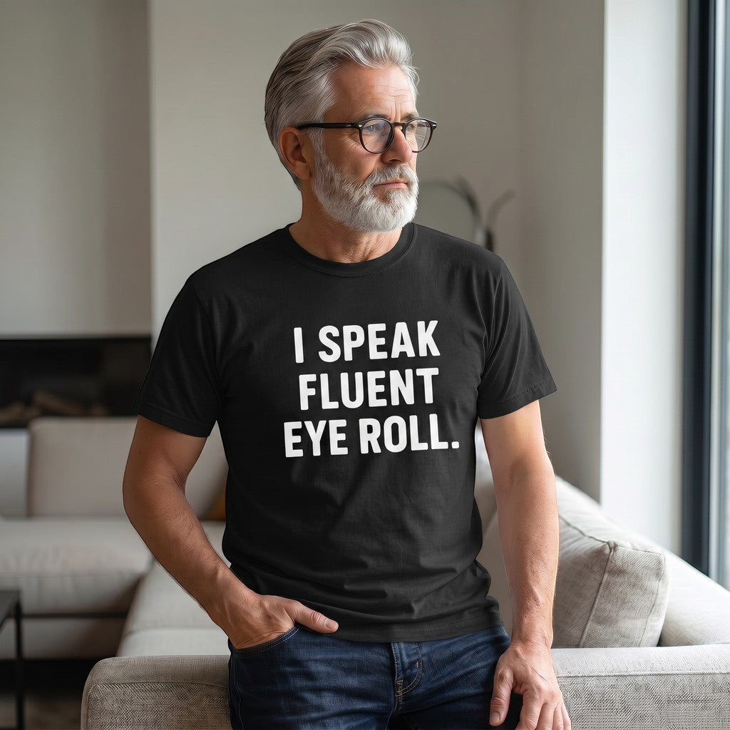 Old Man Snark black unisex cotton t-shirt with I Speak Fluent Eye Roll text worn by a man in a living room