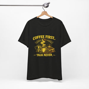 Old Man Snark black cotton t-shirt with yellow "COFFEE FIRST. TALK NEVER." graphic featuring a coffee cup, moka pot, and coffee beans.