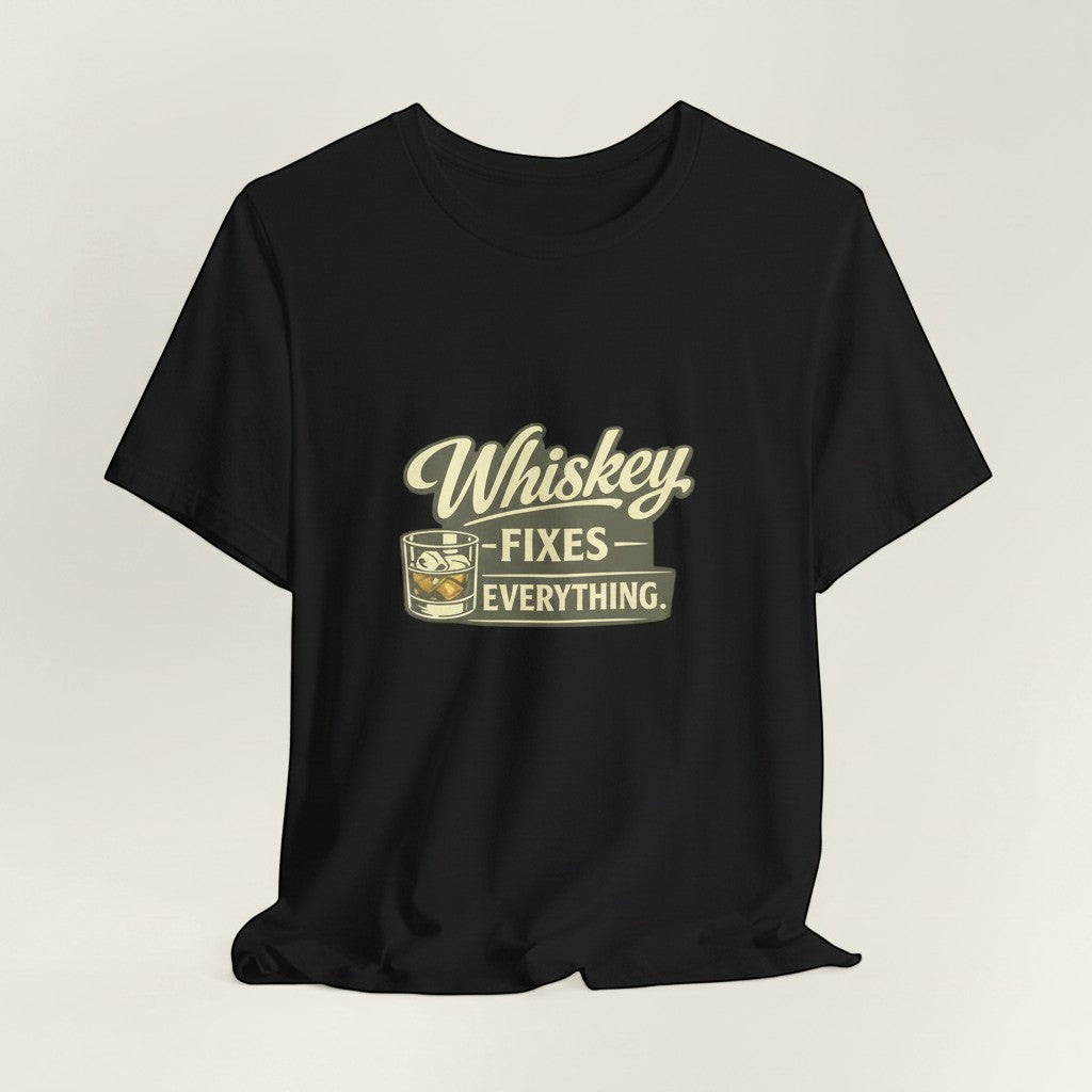 Old Man Snark black cotton t-shirt with "Whiskey Fixes Everything" graphic and whiskey glass illustration.