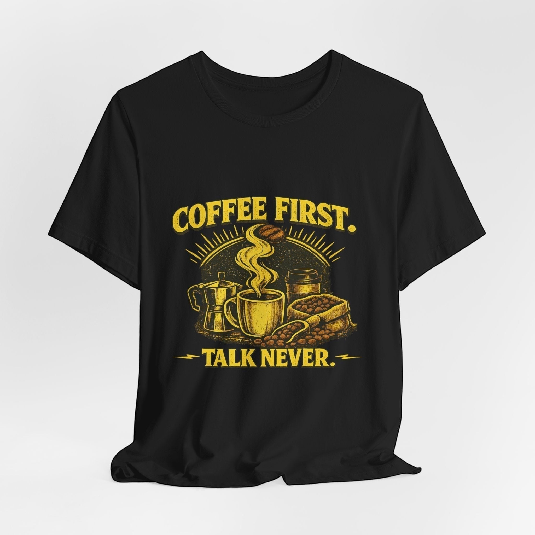 Old Man Snark black cotton t-shirt with yellow graphic of coffee cup, moka pot, coffee beans, and text "COFFEE FIRST. TALK NEVER."