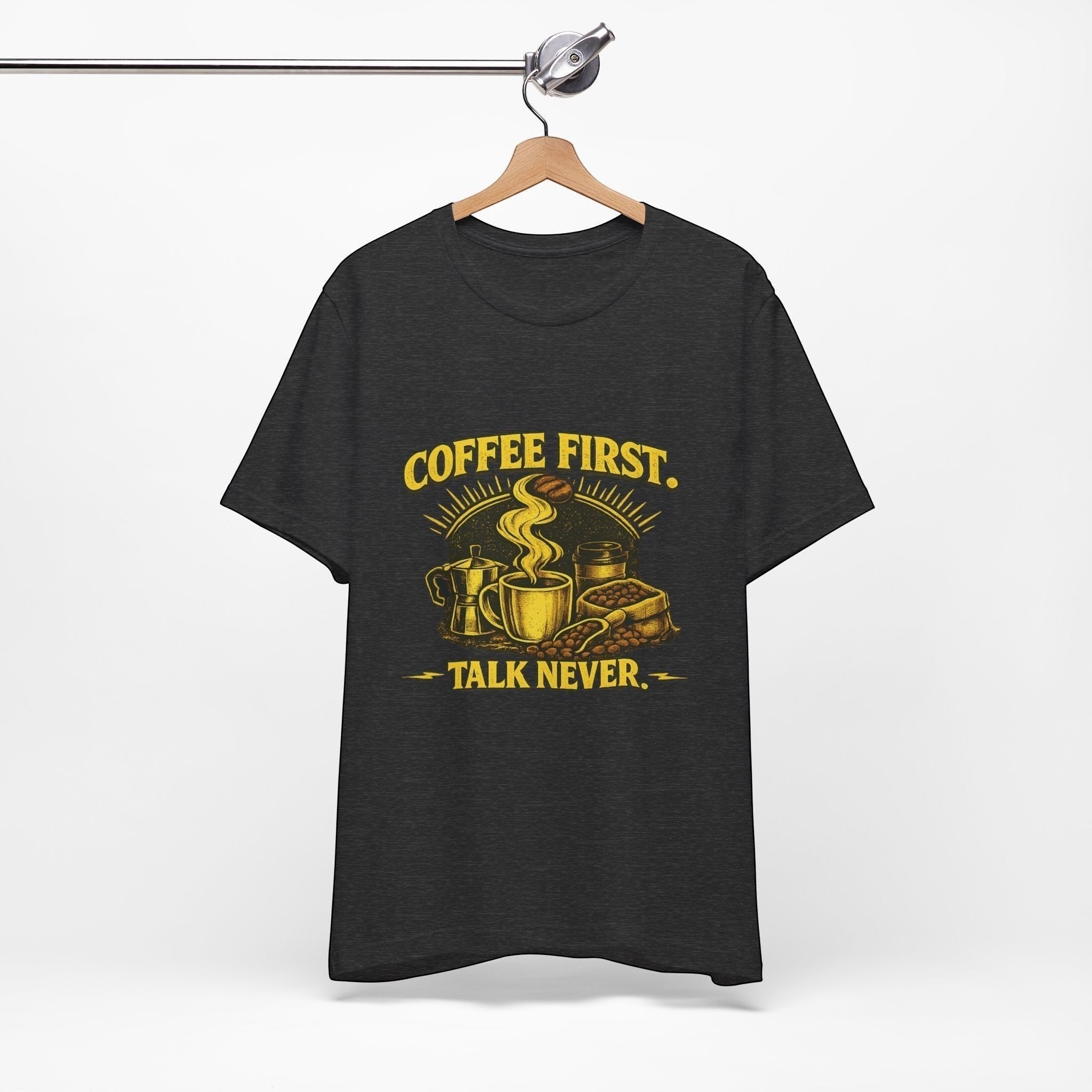 Old Man Snark charcoal cotton t-shirt with yellow graphic of coffee cup, moka pot, coffee beans, and text "COFFEE FIRST. TALK NEVER."