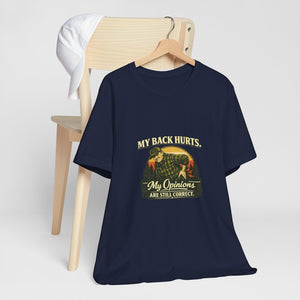 Old Man Snark navy blue 100% cotton t-shirt with a vintage graphic of a man holding his back, text reads "My Back Hurts. My Opinions ARE STILL CORRECT."