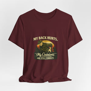 Old Man Snark maroon 100% cotton t-shirt with a vintage graphic of a man holding his back, text reads "My Back Hurts. My Opinions Are Still Correct."