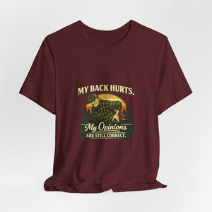 Old Man Snark maroon 100% cotton t-shirt with a vintage graphic of a man holding his back, text reads "My Back Hurts. My Opinions Are Still Correct."