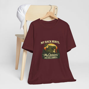 Old Man Snark burgundy 100% cotton t-shirt with a vintage graphic of a man holding his back, text reads "My Back Hurts. My Opinions ARE STILL CORRECT."