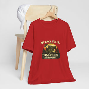 Old Man Snark red 100% cotton t-shirt with a vintage graphic of a man holding his back, text reads "My Back Hurts. My Opinions ARE STILL CORRECT."