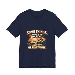 Old Man Snark navy blue cotton t-shirt with vintage humor graphic: man relaxing with a drink and cigar, sunset, and text "Some Things Are Better Off Left Alone... Me, For Example."